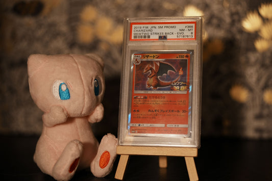 Charizard - Mewtwo Strikes Back [PSA 8]